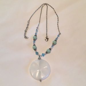 Necklace with blue bead accents.
